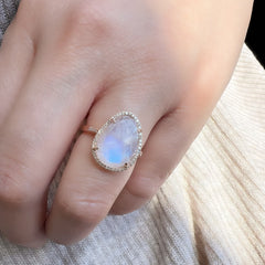 organic shaped raibnow moonstone in solid 14k rose gold with all natural diamonds