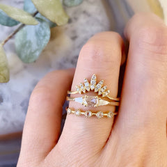 gold marquise arch ring stacked